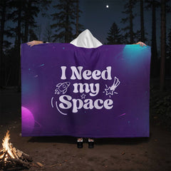 Dark purple blanket with 'I Need My Space' design featuring space motifs.